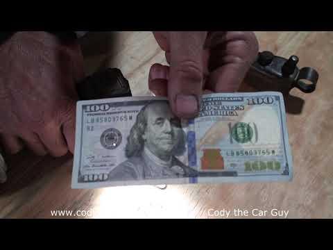 How to spot a fake 100 dollar bill thumbnail